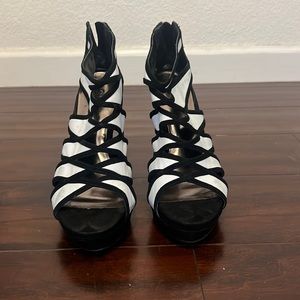 Lightly worn 7M Carlos by Carlos Santana black and white heels